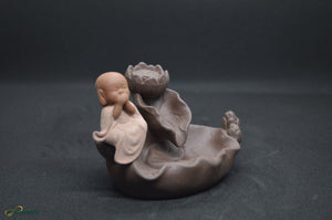 (NEW ARRIVAL) Little monk sitting on a leaf